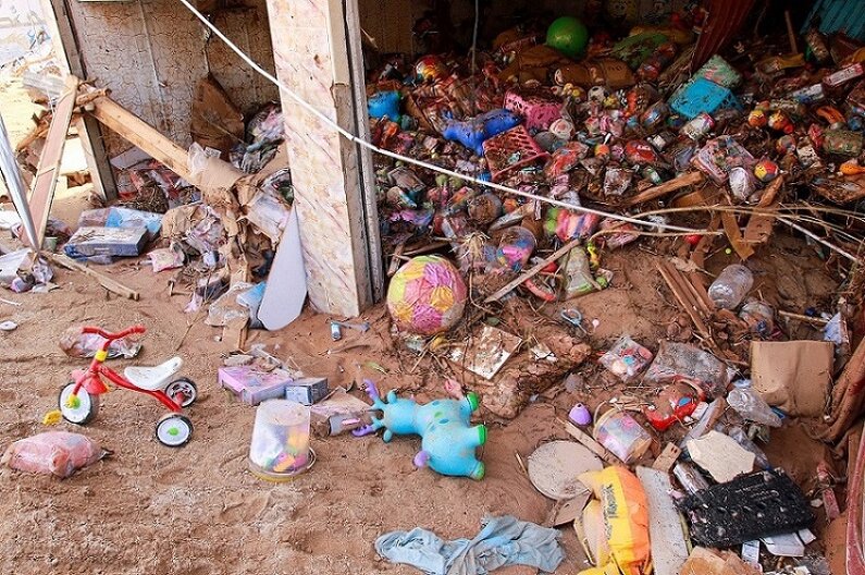 Toys are seen in a flash flood damaged shop in Derna, eastern Libya, on September 11, 2023. Flash floods in eastern Libya killed more than 2,300 people in the Mediterranean coastal city of Derna alone, the emergency services of the Tripoli-based government said on September 12. (Photo by AFP)