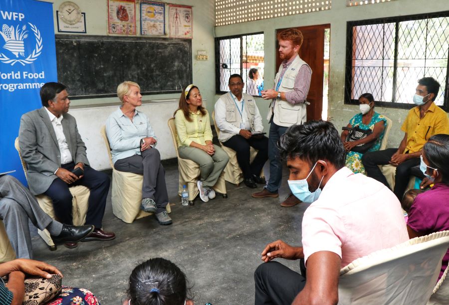 Photo: WFP/ Lakna Paranamanna. Cindy McCain, the U.S. Ambassador to the United Nations agencies in Rome, Julie Chung, the U.S. Ambassador to Sri Lanka and the Maldives and Abdur Rahim Siddiqui, Representative and Country Director to the World Food Programme in Sri Lanka, in conversation with the beneficiaries due to receive WFP assistance in Kurunegala.