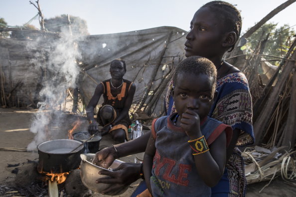 Photo: WFP/Gabriela Vivacqua, Women escaped her home in Leer village, and arriving safely to Nyal village, where thousands of other displaced people are seeking shelter from the conflict engulfing South Sudan