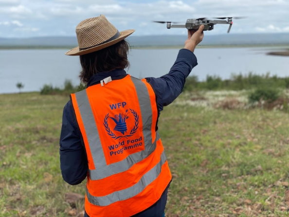 The UN agency started building drone capacity in 2017 (training pictured, Mozambique, December 2020). In 2019, following Cyclone Idai in Mozambique, it deployed drones for the first time in an emergency response to conduct rapid post-disaster assessments as well as coordinate with national officials and partners on the ground. WFP/INGC/Antonio Jose Beleza 