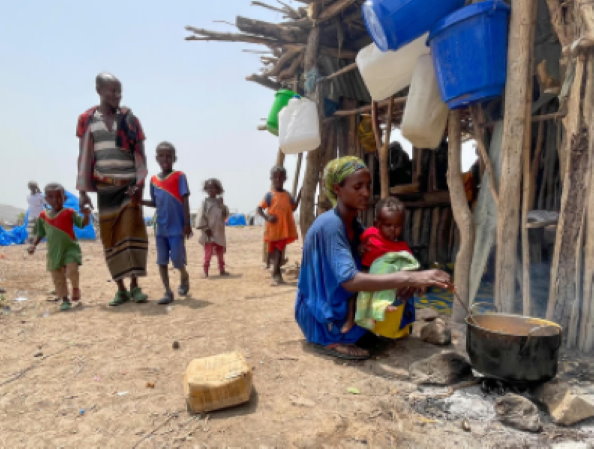 Photo: WFP/ Claire Neville A displaced family cooking in Afar region, Ethiopia