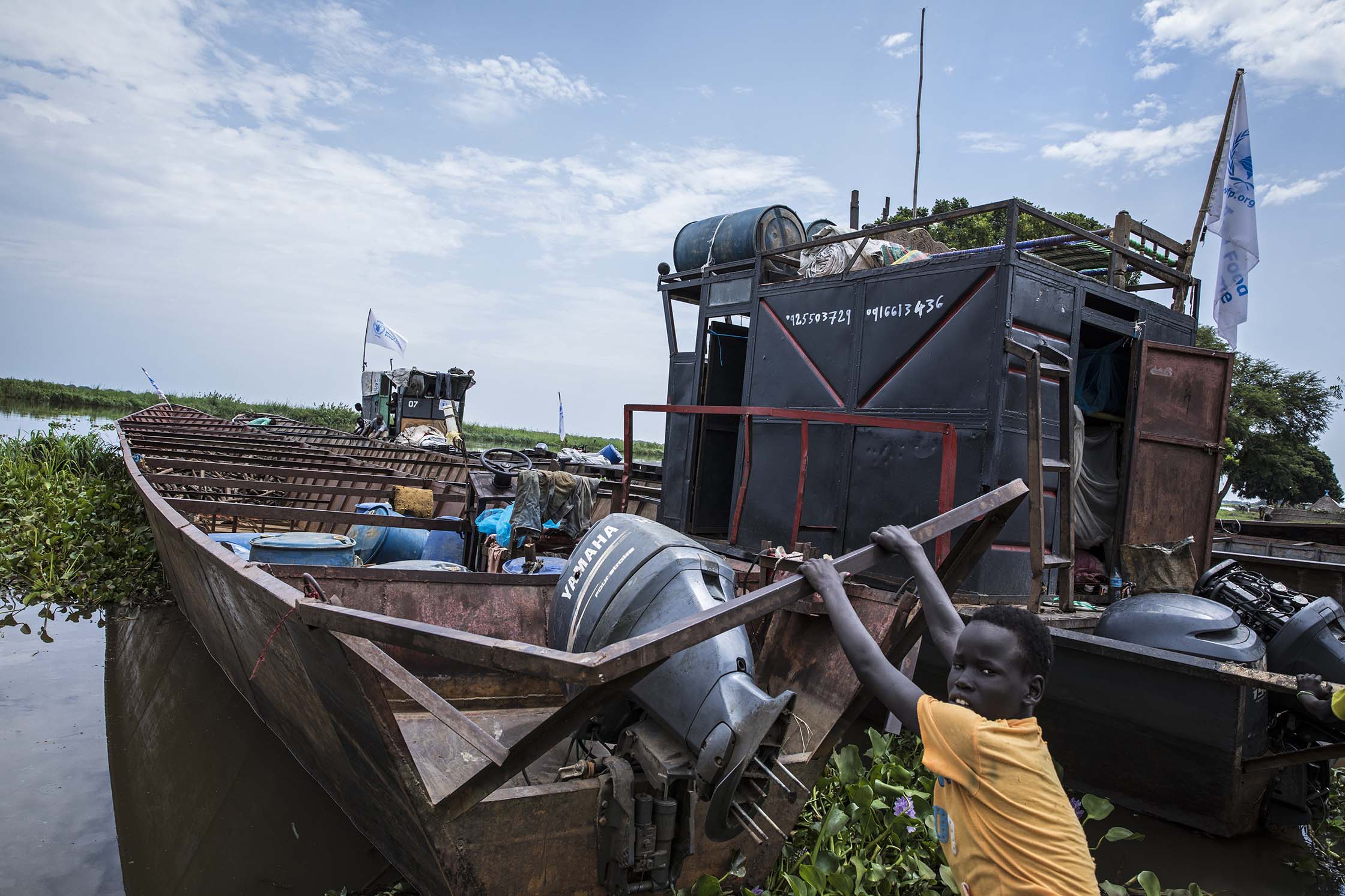 River convoy reaches isolated areas in Ulang, South Sudan, saving millions of dollars on costly airdrops