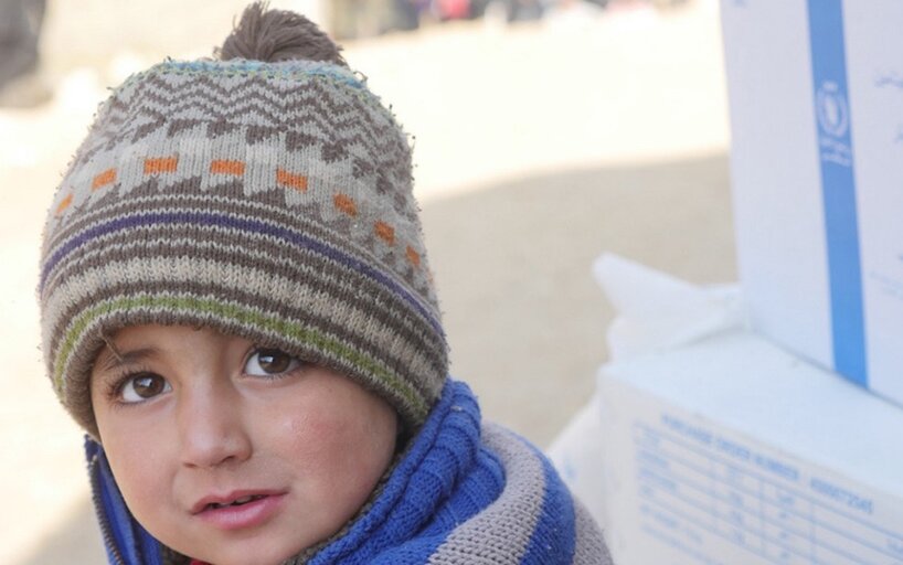Child in WFP's food assistance distribution center in Syria