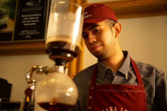 man preparing coffee