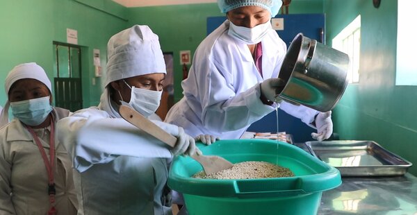 women mixing ingredients