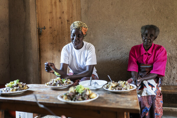 Two women sitting and eating a meal