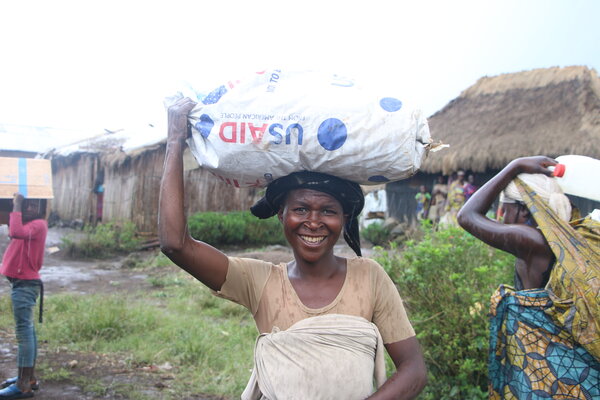 Woman with bag of food