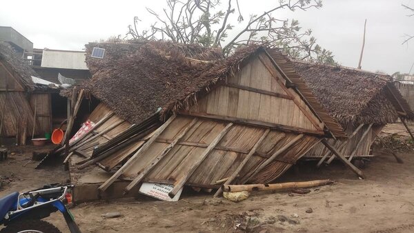 destroyed wooden house