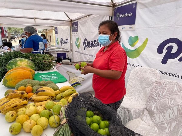 Noemi Amaya in front of her stall at the local market.