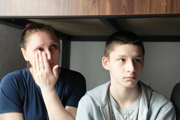 Liubov Arseniev and her son Egor had to leave North Kharkiv with their family and are now sheltered in Poltova. Photo: WFP/Reem Nada