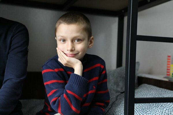 Ilia Arseniev, 7, had to leave Kharkiv with his family and is now sheltered in Poltova. Photo: WFP/Reem Nada
