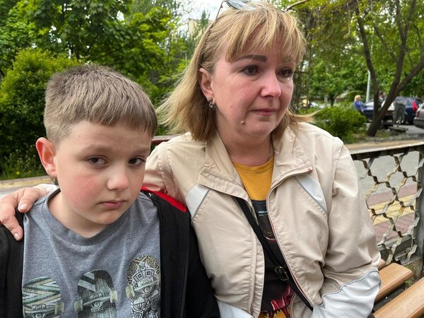 Oksana Potaenko, a 46-year-old mother from Mariupol, and her son Oleksiy, 9.