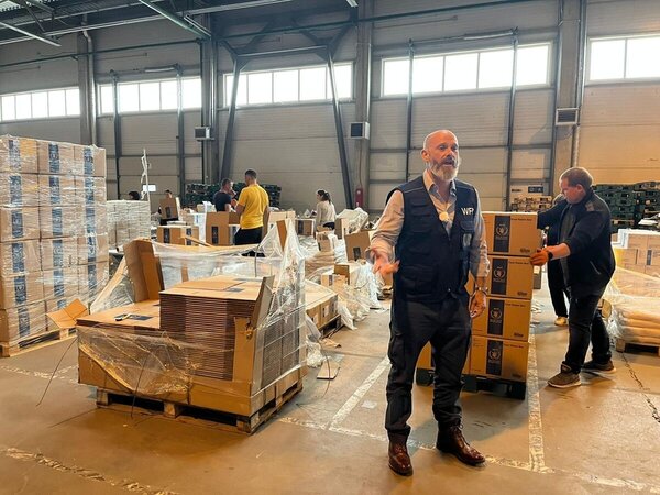Matthew Hollingworth, Ukraine Emergency Response Coordinator, at the Berger-Cargo warehouse that WFP has rented e for the kitting of rations, which comprise rice, pasta, oil and canned meat. Photo: WFP/Paul Anthem