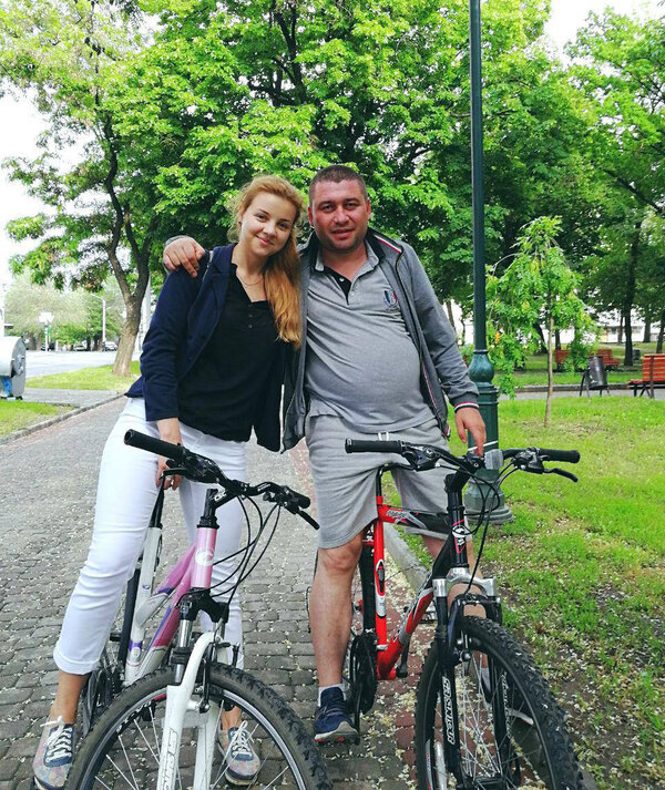 Nina and her husband cycling