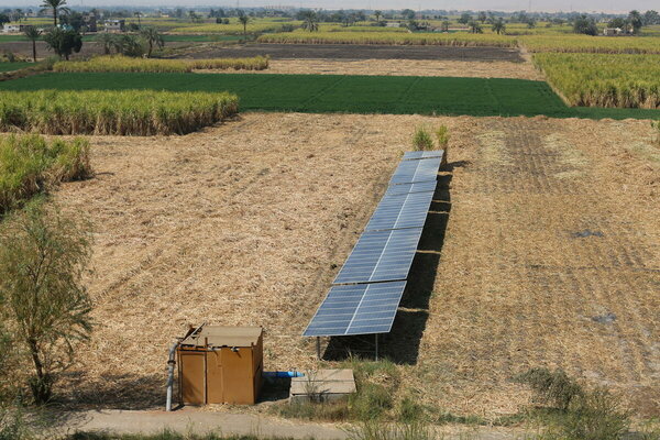 solar panel in the middle of a field