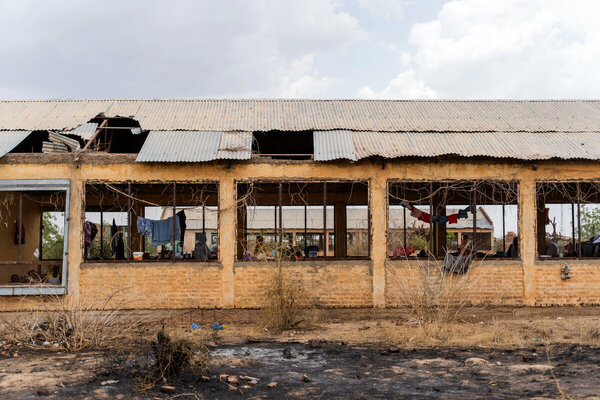 Makeshift shelter for displaced people in Sudan in old farm building