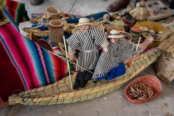 A depiction of Uru community member on a boat