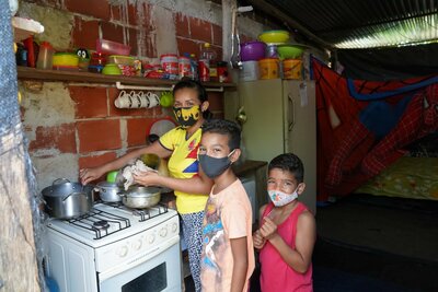 a family in a kitchen