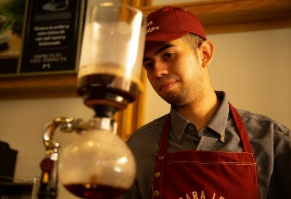 man preparing coffee