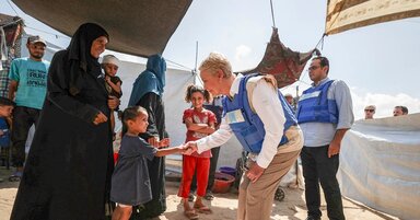 WFP Executive Director Cindy McCain visits a family in their makeshift tent in Deir al-Balah, Gaza, during a visit to Palestine in August 2025. 