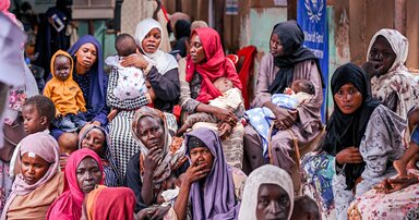 Women await assistance at a WFP-supported nutrition clinic in Khartoum, Sudan. Famine has been confirmed in parts of the country while nearly 25 million people face acute hunge
