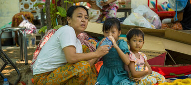 A family uprooted by the earthquake at a shelter in Mandalay