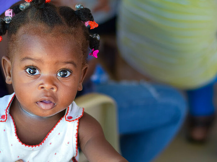 Baby in one of WFP's distribution centres in Haiti