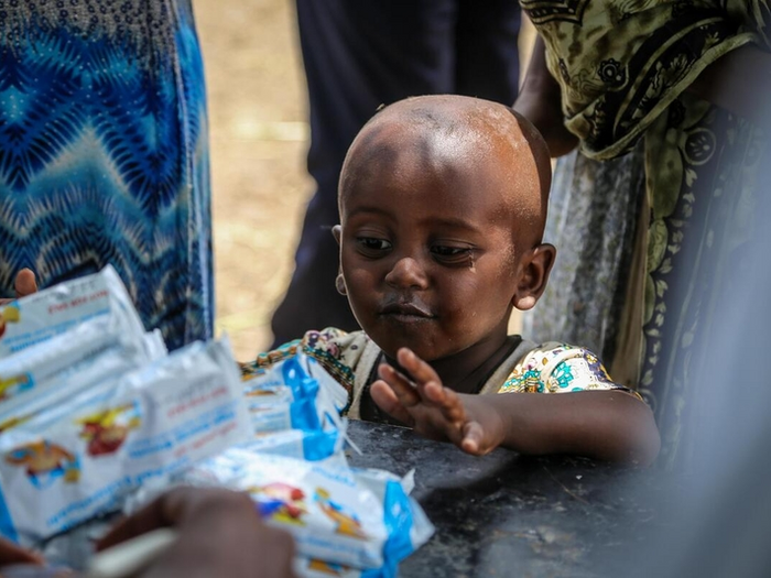 a child is picking a WFP snack