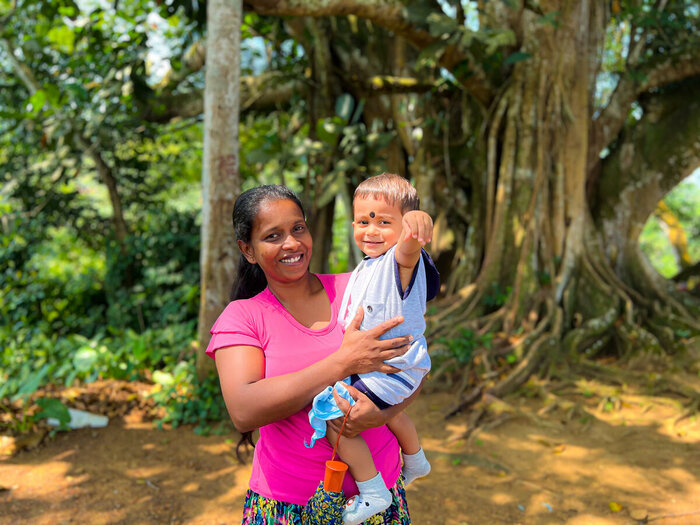  R. A Chandima with her grandchild Dulan Sampath who is 11 months old, Rathnapura, Sri Lanka
