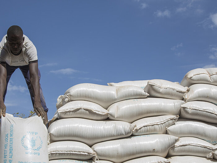 WFP staff offloading nutritious food items to fight malnutrition in Burkina Faso