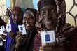 Women in Galkayo in Central Somalia wait to receive their cash entitlements from the European Union. Photo: WFP/Karel Prinsloo