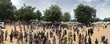 <em>Hundreds of new arrivals await registration at the camp for displaced people in Bama town. Photo: WFP/Chi Lael</em>