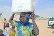 As civilians come increasingly under attack, they are forced to flee and depend on humanitarian assistance where available. Photo: WFP/Simon Pierre Diouf