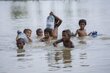 <em>Climate change: Children in Mirpurkhas, rural Sindh, find joy amid the misery of floods destroying thousands of homes and livelihoods. Photo: WFP/Arete/Saiyna Bashir</em>