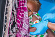 Taking mid-upper arm circumference measurement