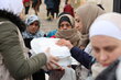 Quake survivors in Syria receive WFP hot meals. Hussam Al Saleh
