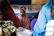 Fatima Ahmed waits for WFP food assistance in Nigeria's Katsina State. Abdul Ozavogu