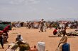 Makeshift tents and people surrounded by sand at Tawila displacement camp in Sudan's North Darfur State. Photo: WFP/Mohamed Galal