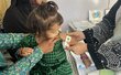 Photo: WFP/Isheeta Sumra, A mother with her malnourished daughter came to a WFP supported clinic in Kandahar to receive nutrition support