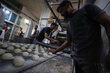 WFP/Ali Jadallah. Limited bread production resumes at a WFP-supported bakery in Deir al-Balah.