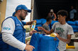  Photo: WFP/Gustavo Vera. WFP Freddy Parada delivering food baskets at Maiquetía, Venezuela