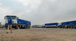  WFP/Abubakar Garelnabei WFP trucks refuelling before departing Port Sudan for Khartoum in December 2024