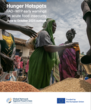 Cover image of report, showing people in front of stacks of grain.