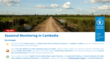 A rural dirt road runs through green agricultural fields in Cambodia, with patches of water and tall grasses on either side under a partly cloudy sky. The image is overlaid with text reading “Seasonal Monitoring in Cambodia” and “May 2026,” alongside key messages about localized dryness, heat stress, and expected erratic seasonal conditions, with the World Food Programme (WFP) logo displayed on the right.