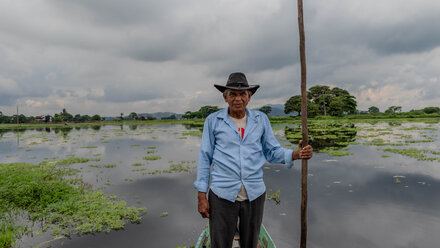 Andrés Gordillo in his canoe, navigating through the communities affected by flooding in Ecuador.
