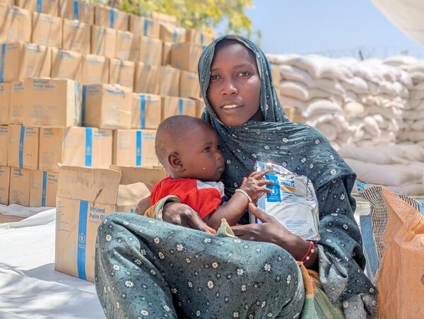 WFP/Lena von Zabern. Woman from Western Darfur, arrived 4 month ago with her 6-month-old baby in Koulbus. She receives WFP treatment against malnutrition 