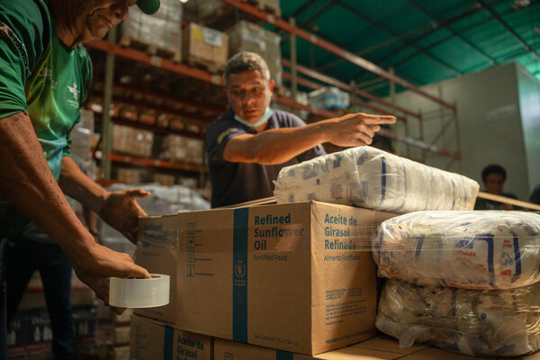 WFP staff preparing food parcels for dispatch in Venezuela