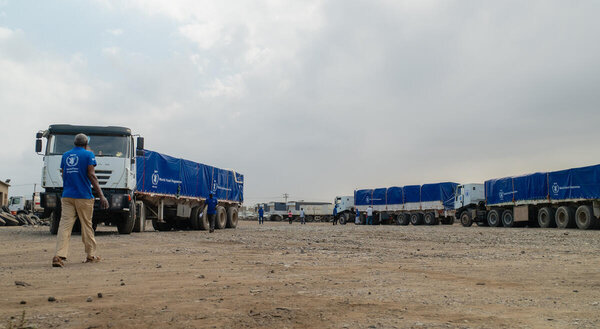  WFP/Abubakar Garelnabei WFP trucks refuelling before departing Port Sudan for Khartoum in December 2024