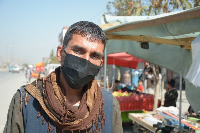 Omid gave up being a construction worker to run his stall. Photo: WFP/Philippe Kropf