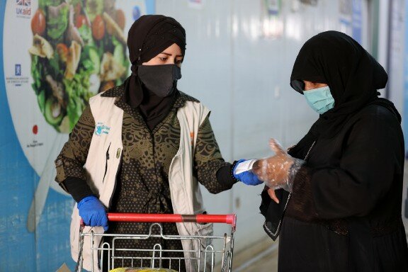 two people at a supermarket